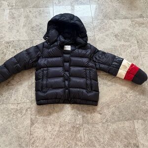 Moncler Black Puffer Jacket with Red and White Accents